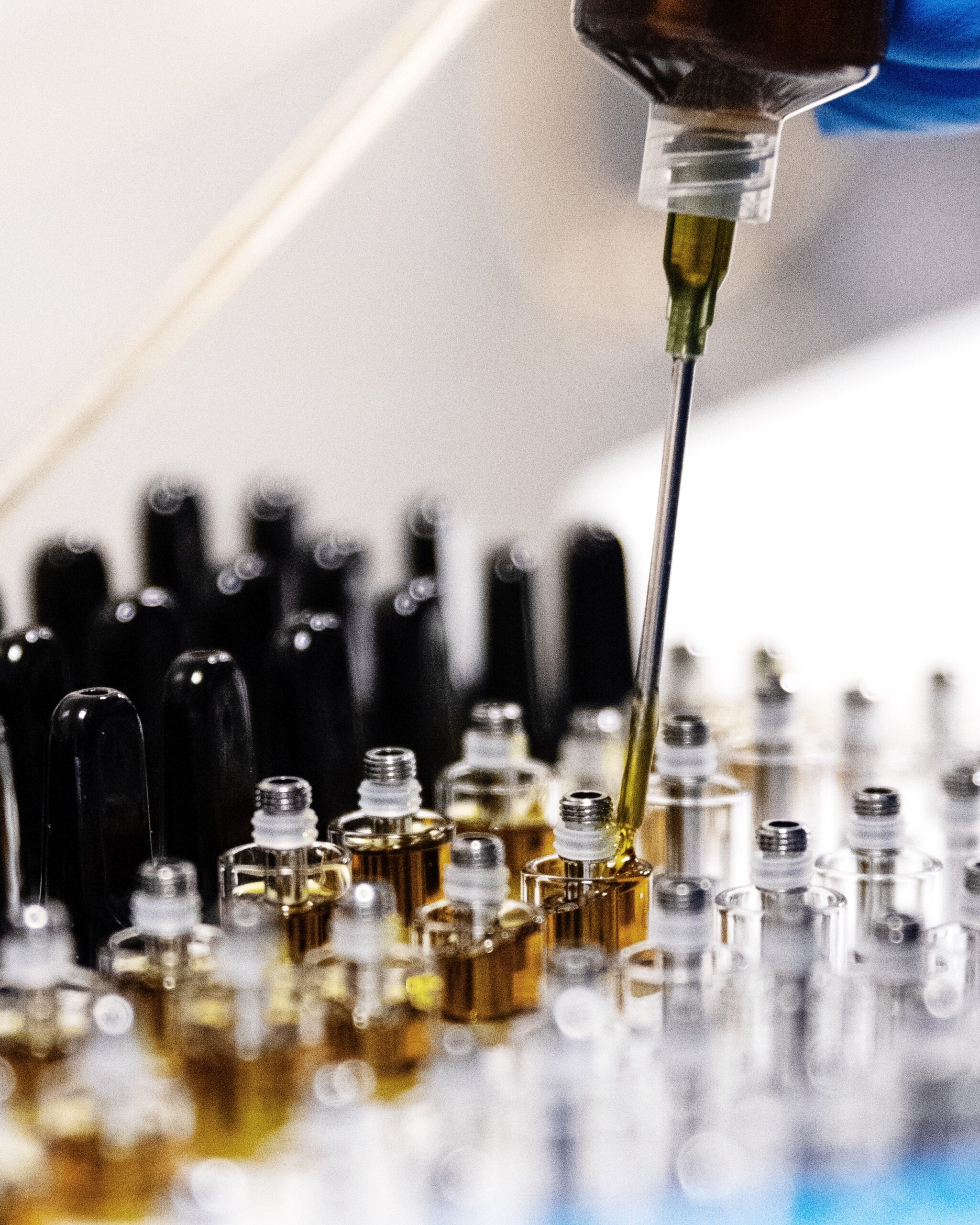 Close up of cannabis vape oil being transferred into cartridge